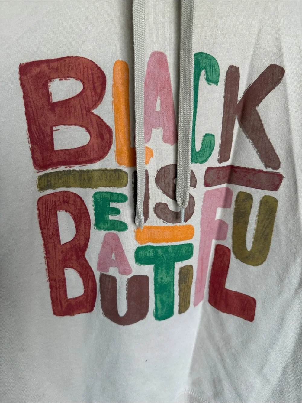 Well Worn Beige Hoodie Sweater with Multicolor 'Black Is Beautiful' Graphic